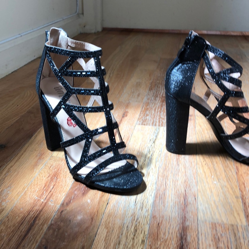 A lovely pair of Black sandal heels with glitter.